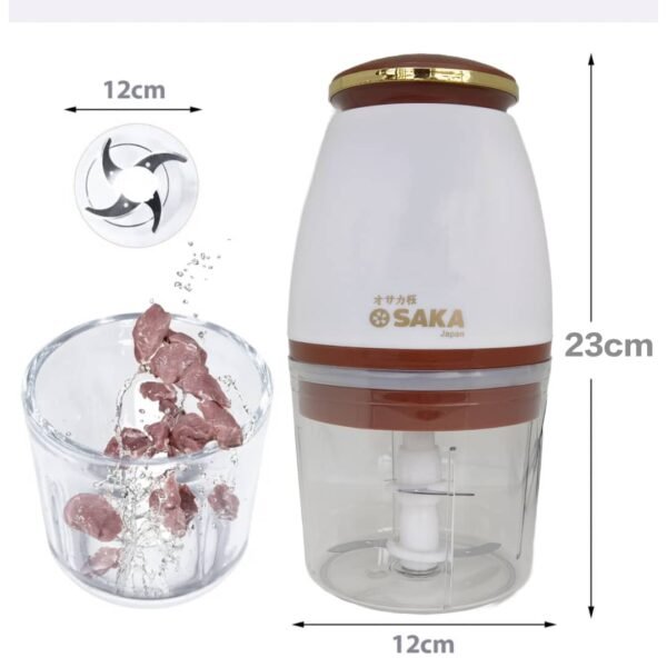 Making baby food with compact electric food processor and puree consistency