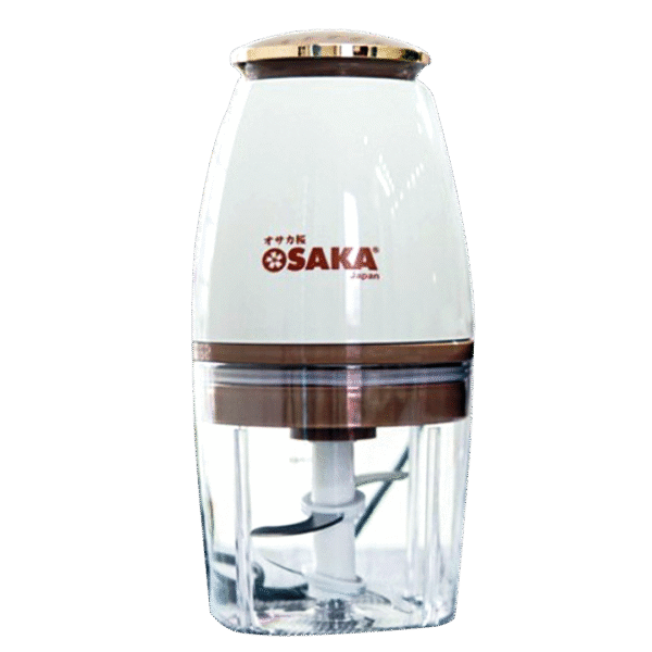 Fruit smoothie being blended in multifunctional electric food processor